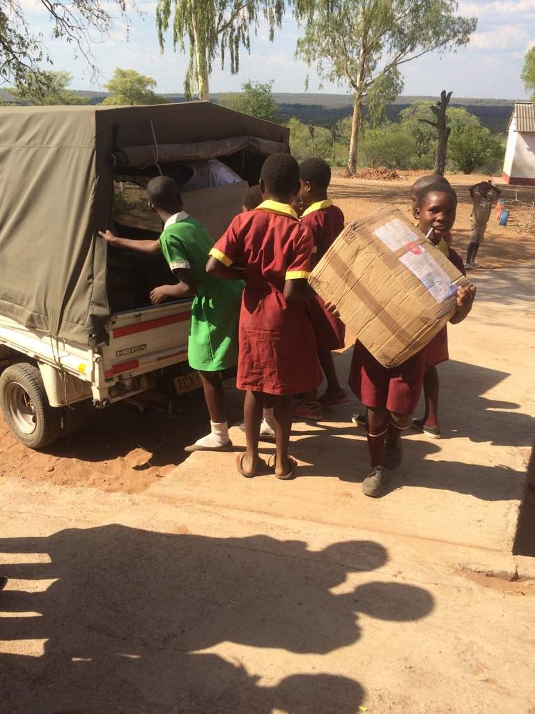 Chisuma Primary School receiving Sandroyd tracksuits